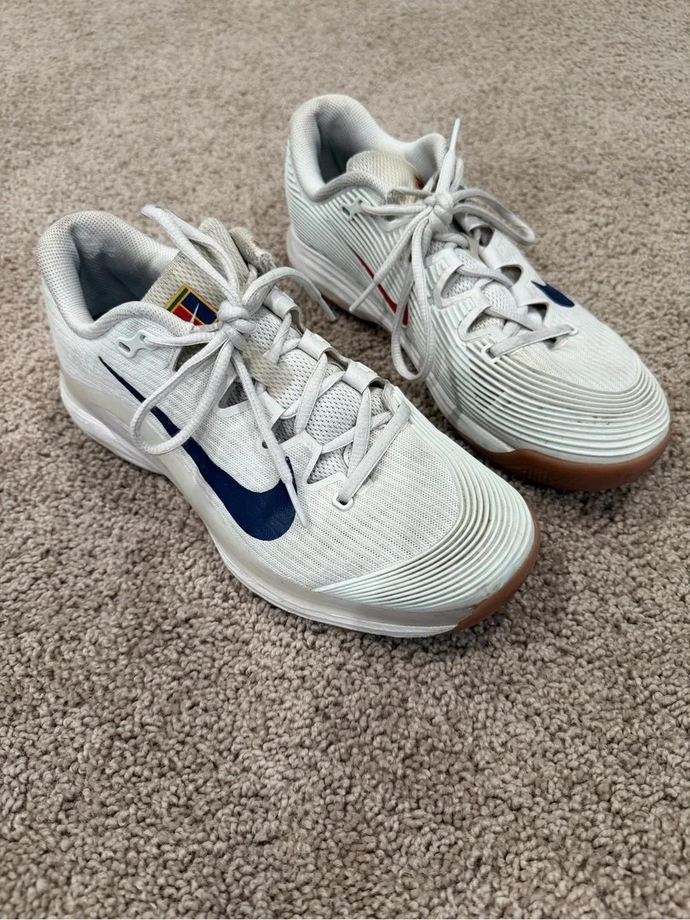 Nike White Sneakers with Navy Swoosh and Gum Outsole